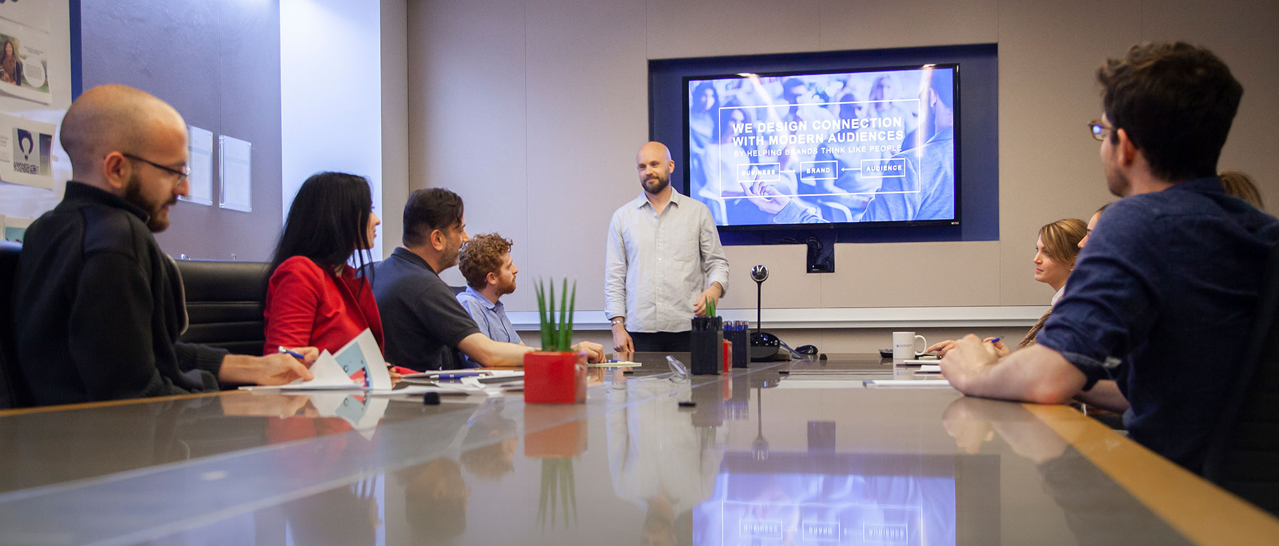 Team Meeting reviewing Presentation